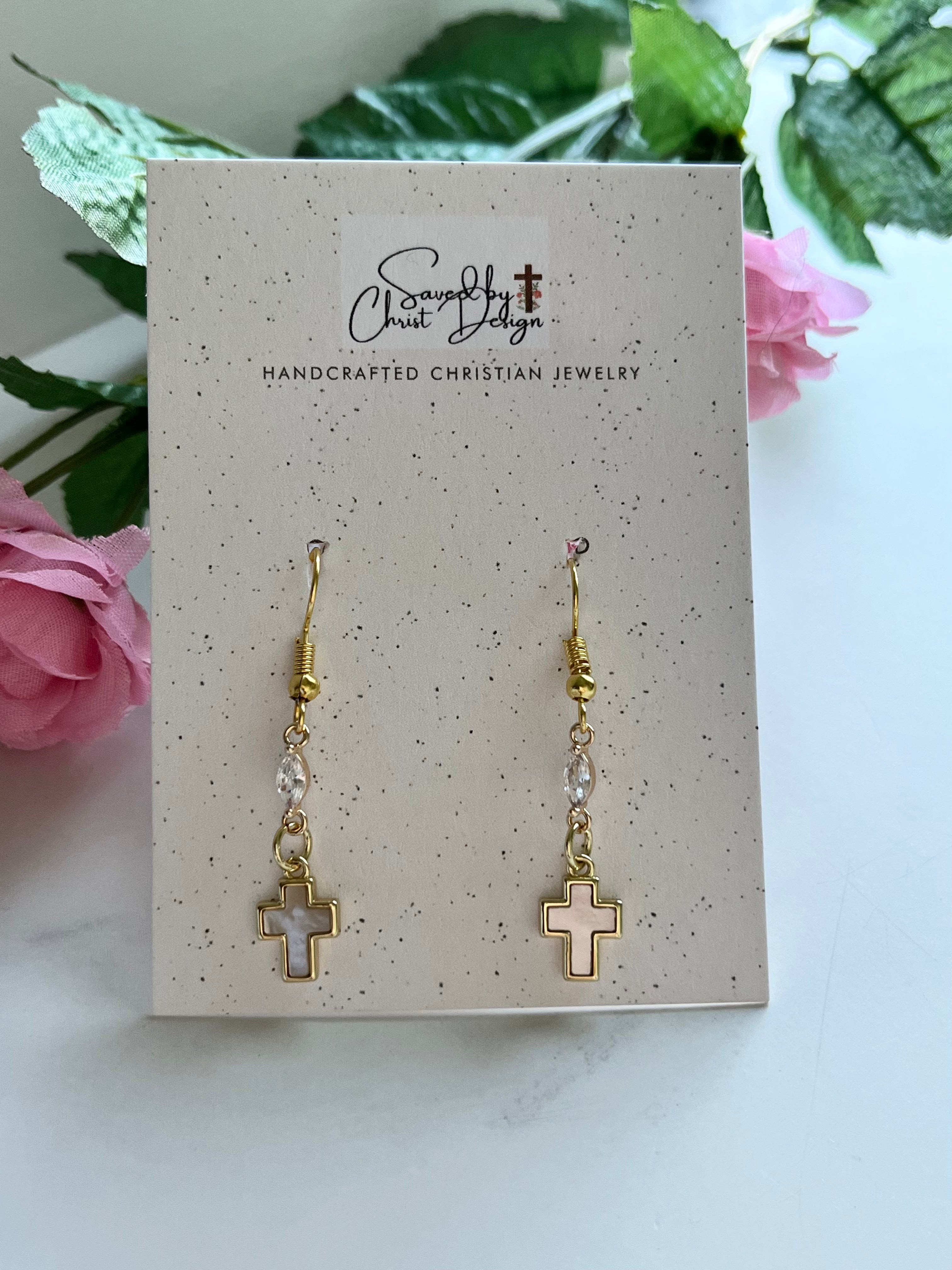 Gold-tone cross drop earrings with bead links and small dangling cross charms.