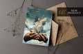 Greeting card with illustrated teal cover and matching kraft envelope