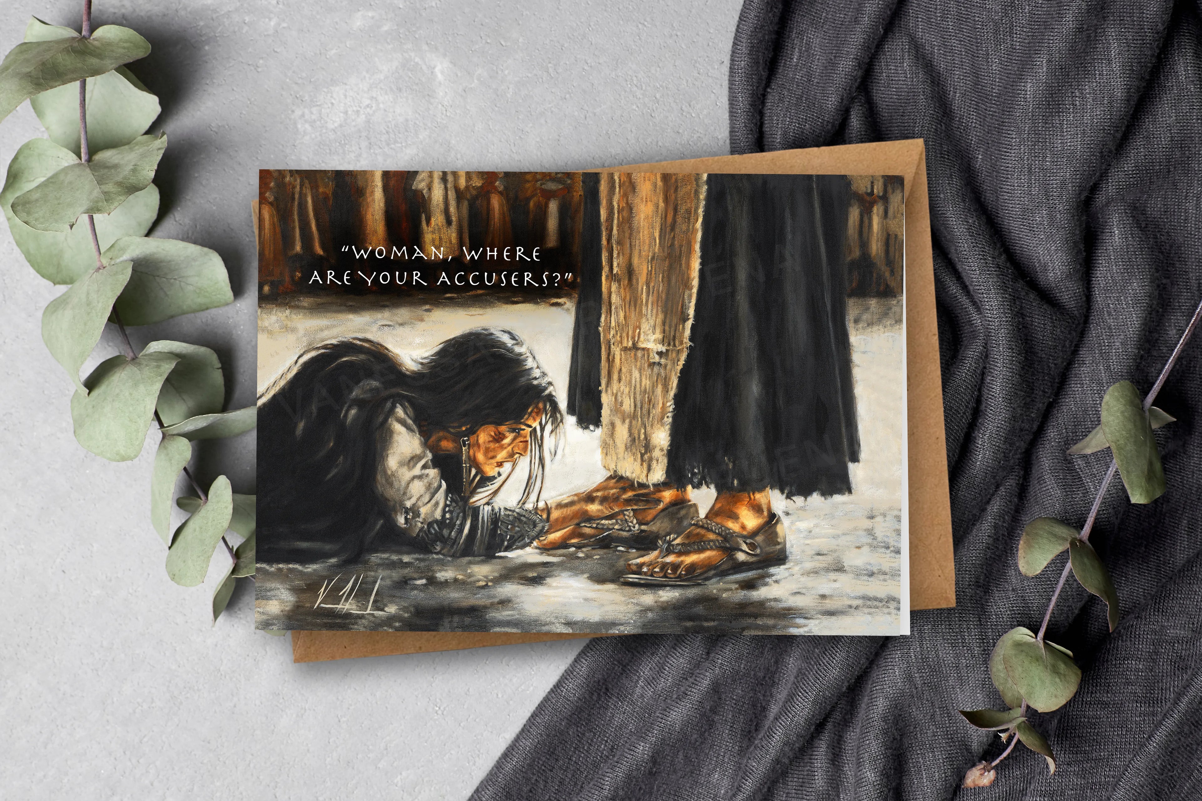 Greeting card front with illustrated woman by a fire and quote "Woman, where are your accusers?"