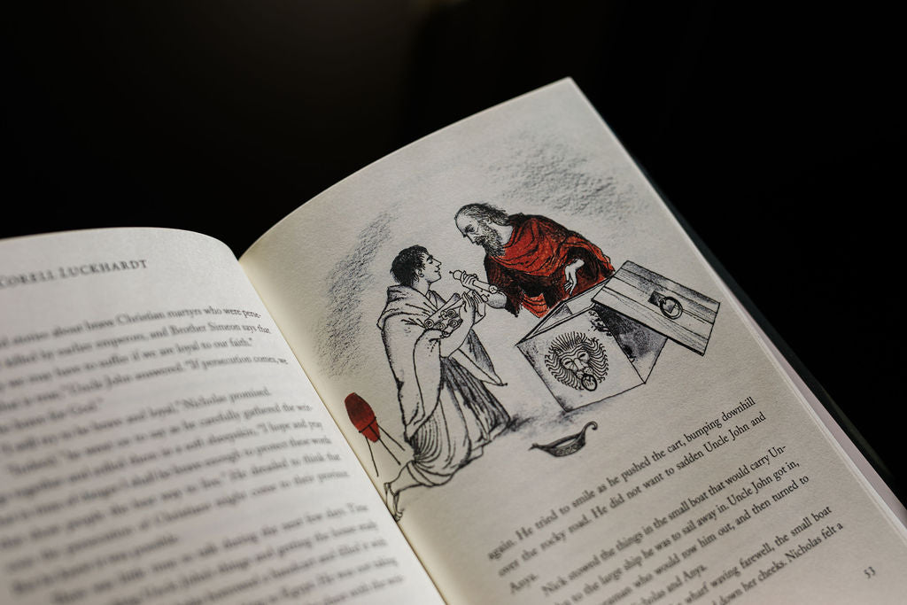Open illustrated storybook page with character sketch and small red figure
