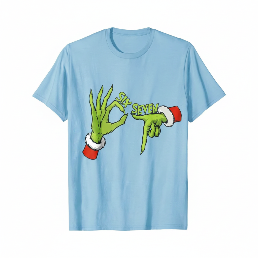 Light blue Christmas T-shirt with green hand graphic and 'Six Seven' print