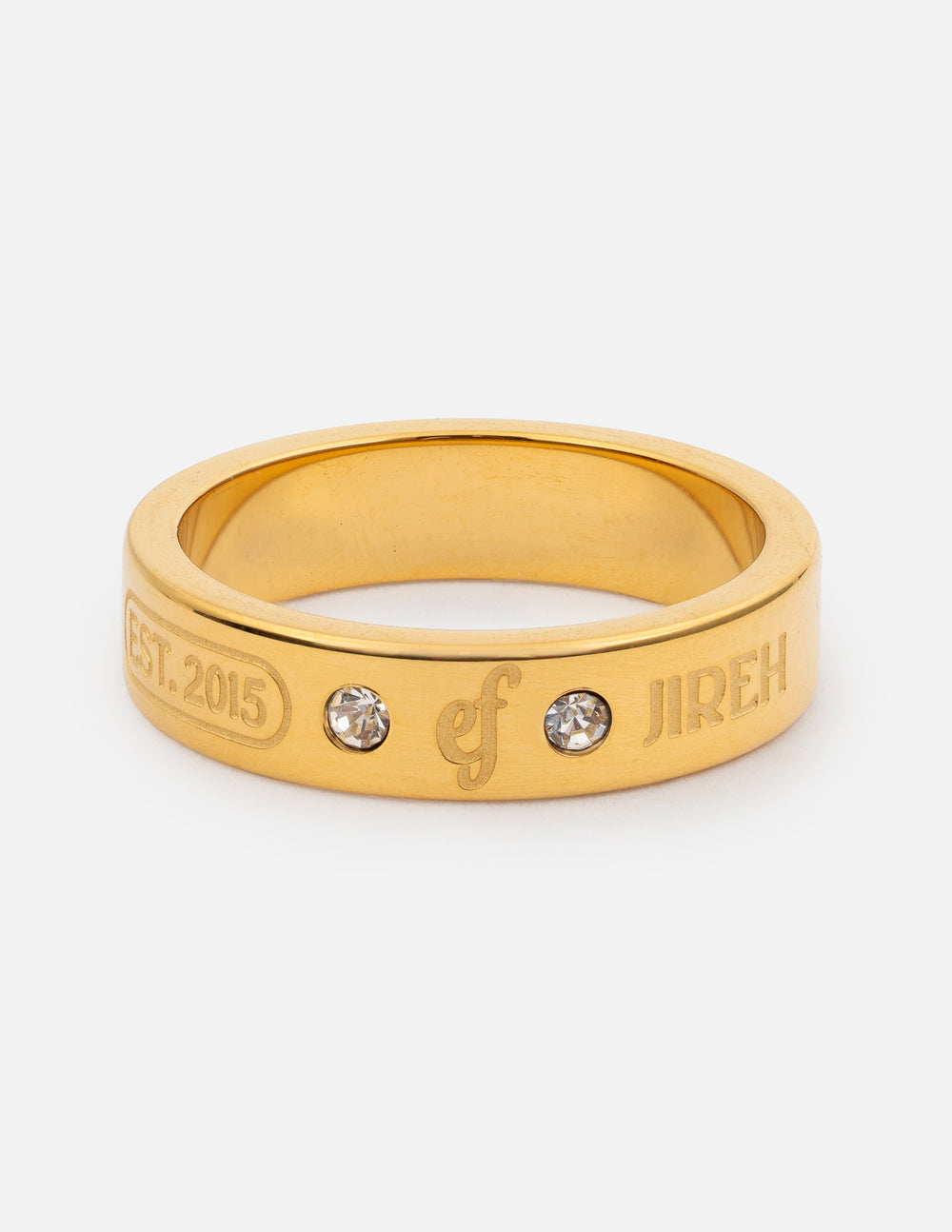 Gold-tone gemstone logo ring with two clear stones on the band