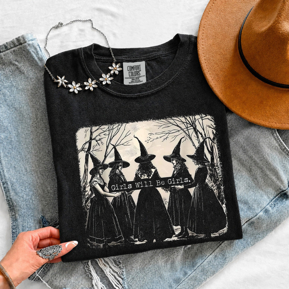 Black girls Halloween T-shirt laid flat, crew neck and front witch graphic with tag