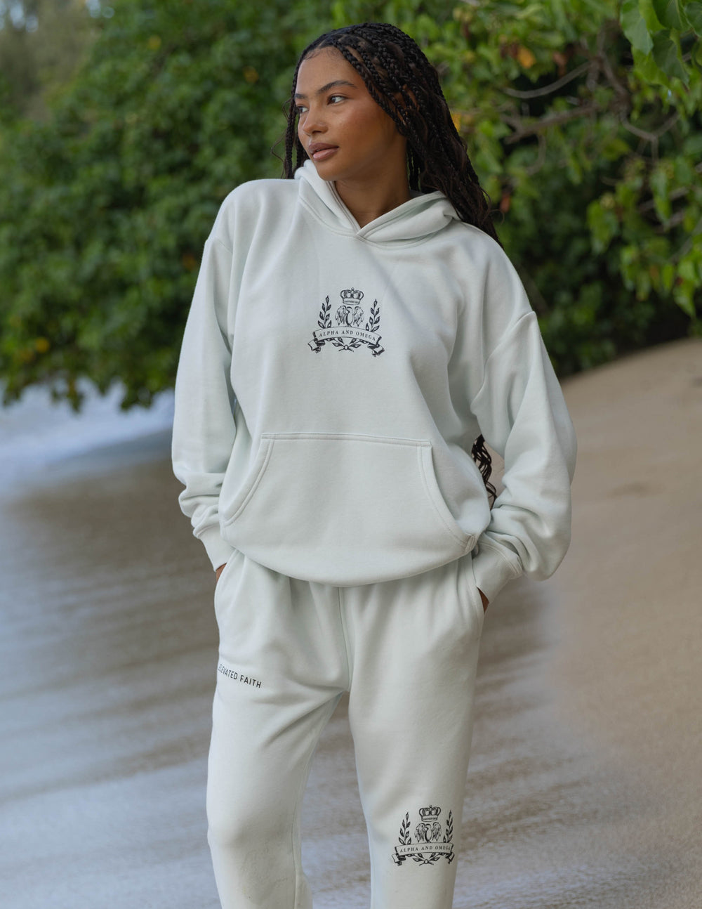 Unisex sweatpants, off-white, full-length with crest logo on one leg