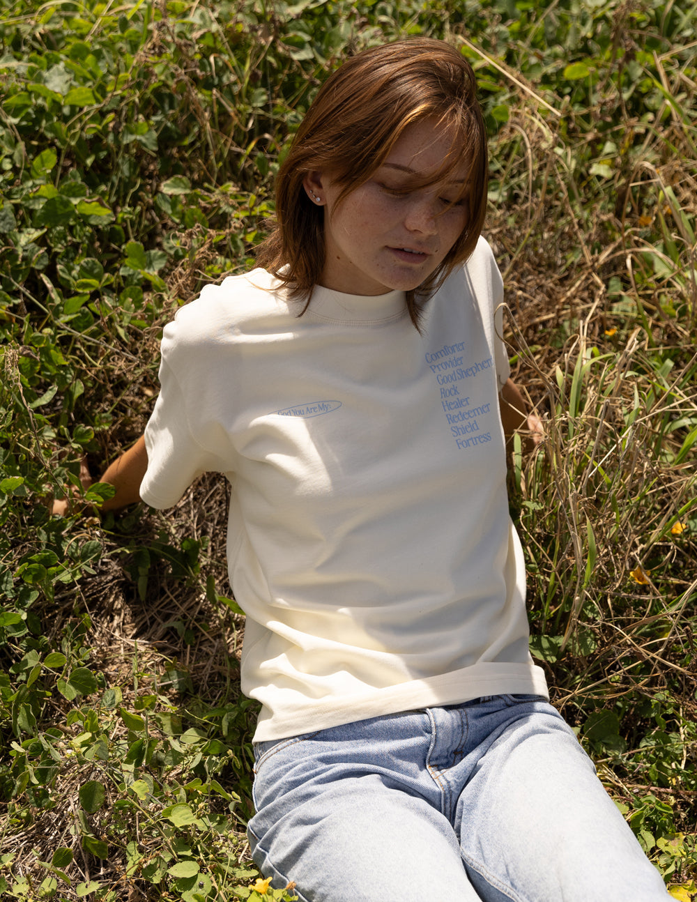 Cream unisex short-sleeve T-shirt with front graphic text