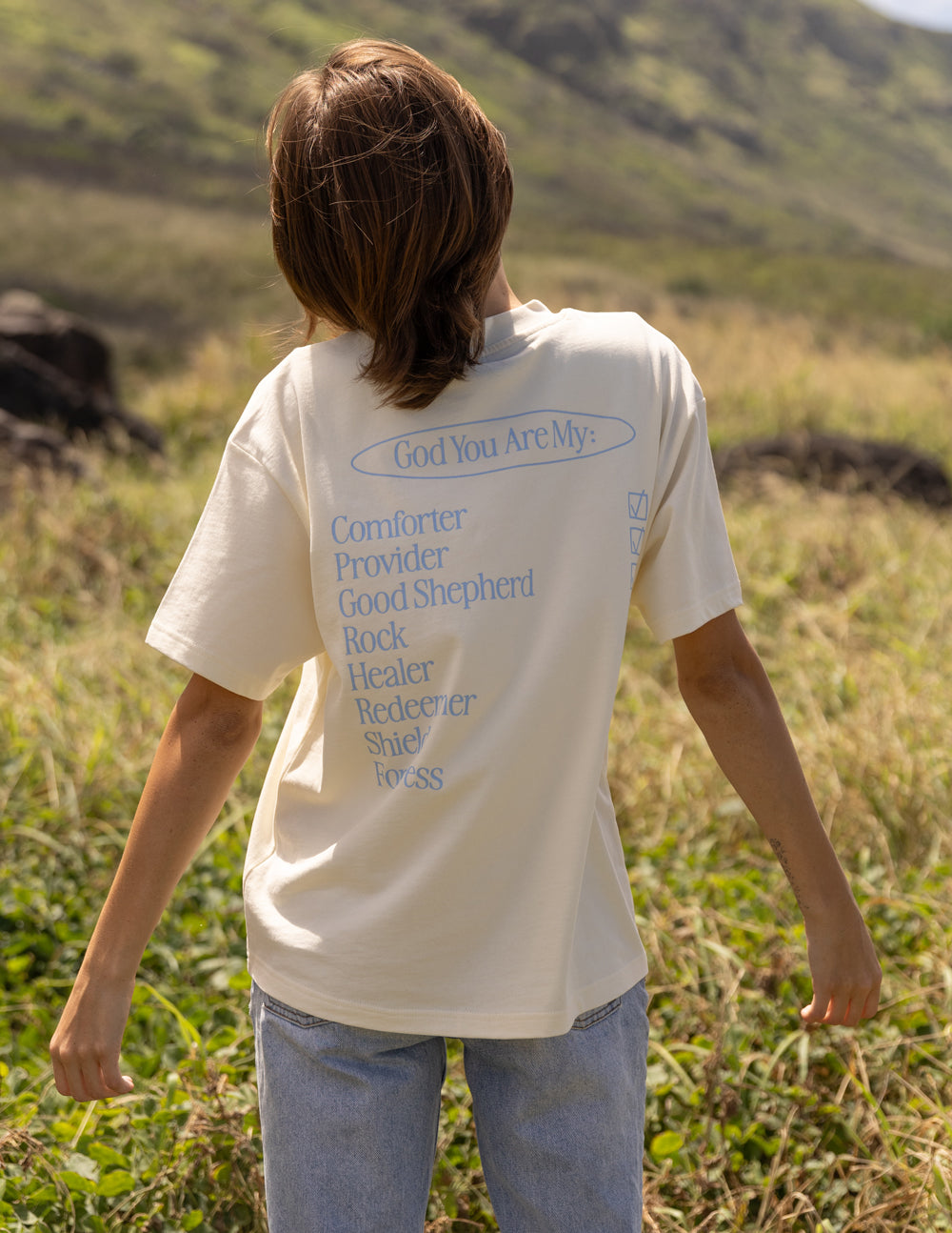 Cream unisex short-sleeve T-shirt with back text list graphic