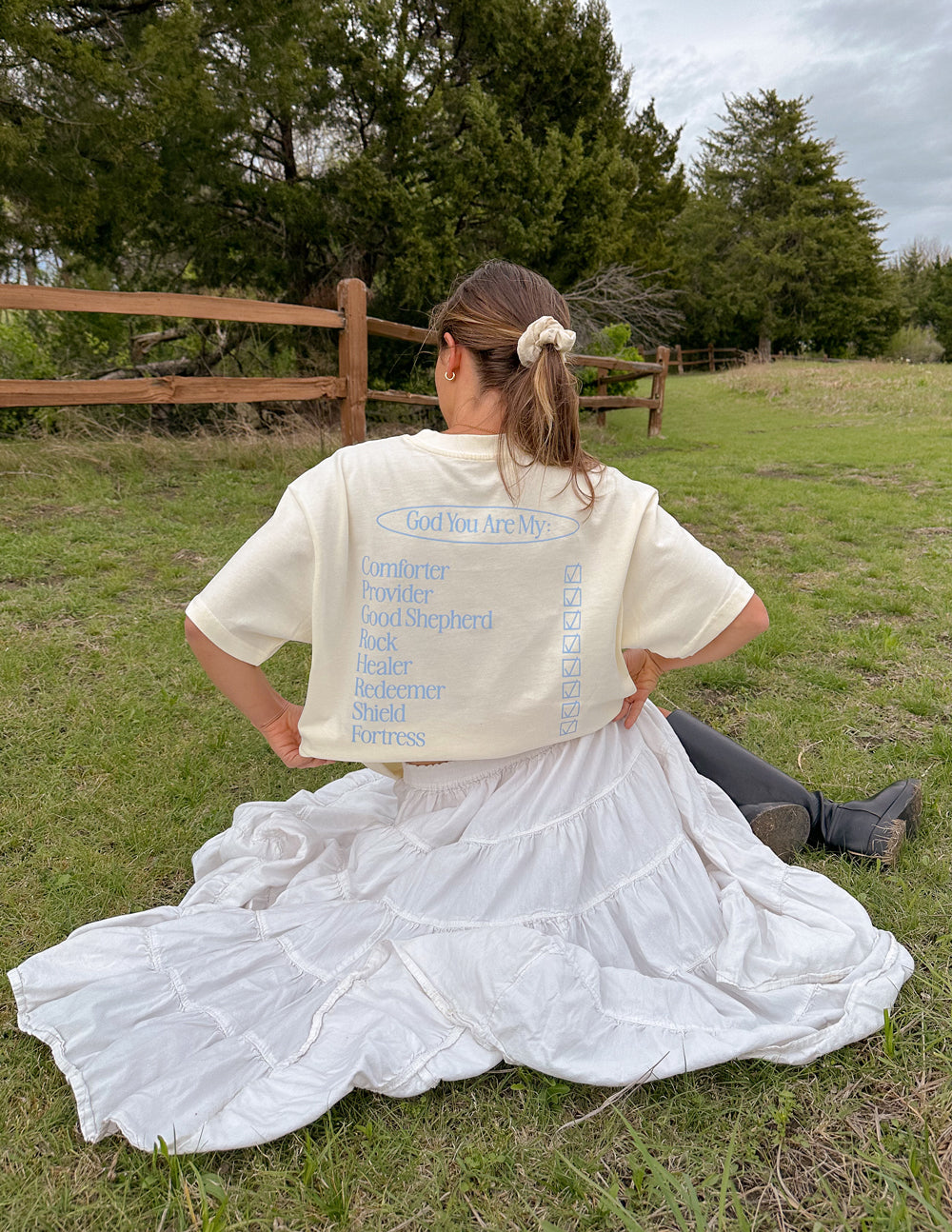 Cream unisex short-sleeve T-shirt with back graphic text and vertical print