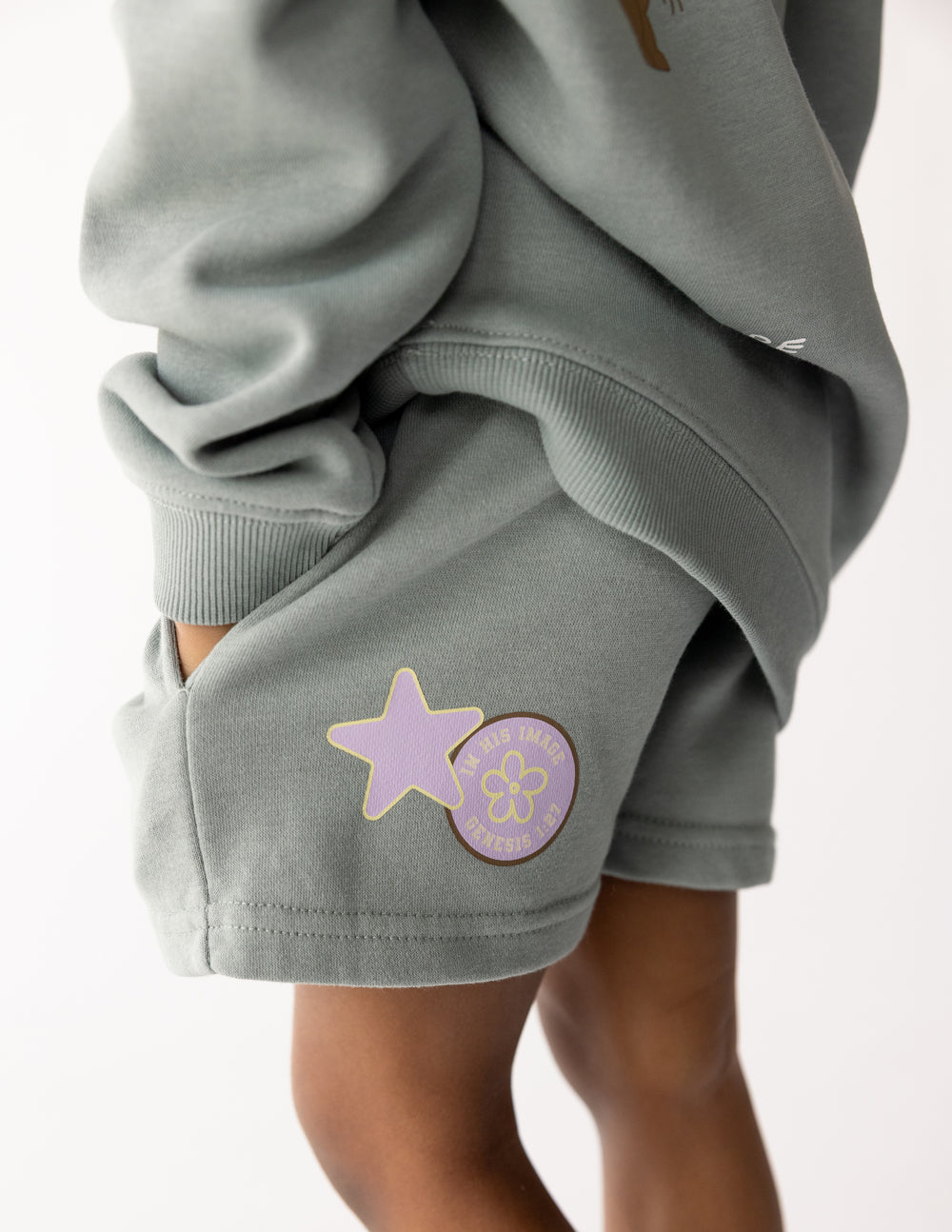 Kids gray shorts with star-and-flower patch on side pocket