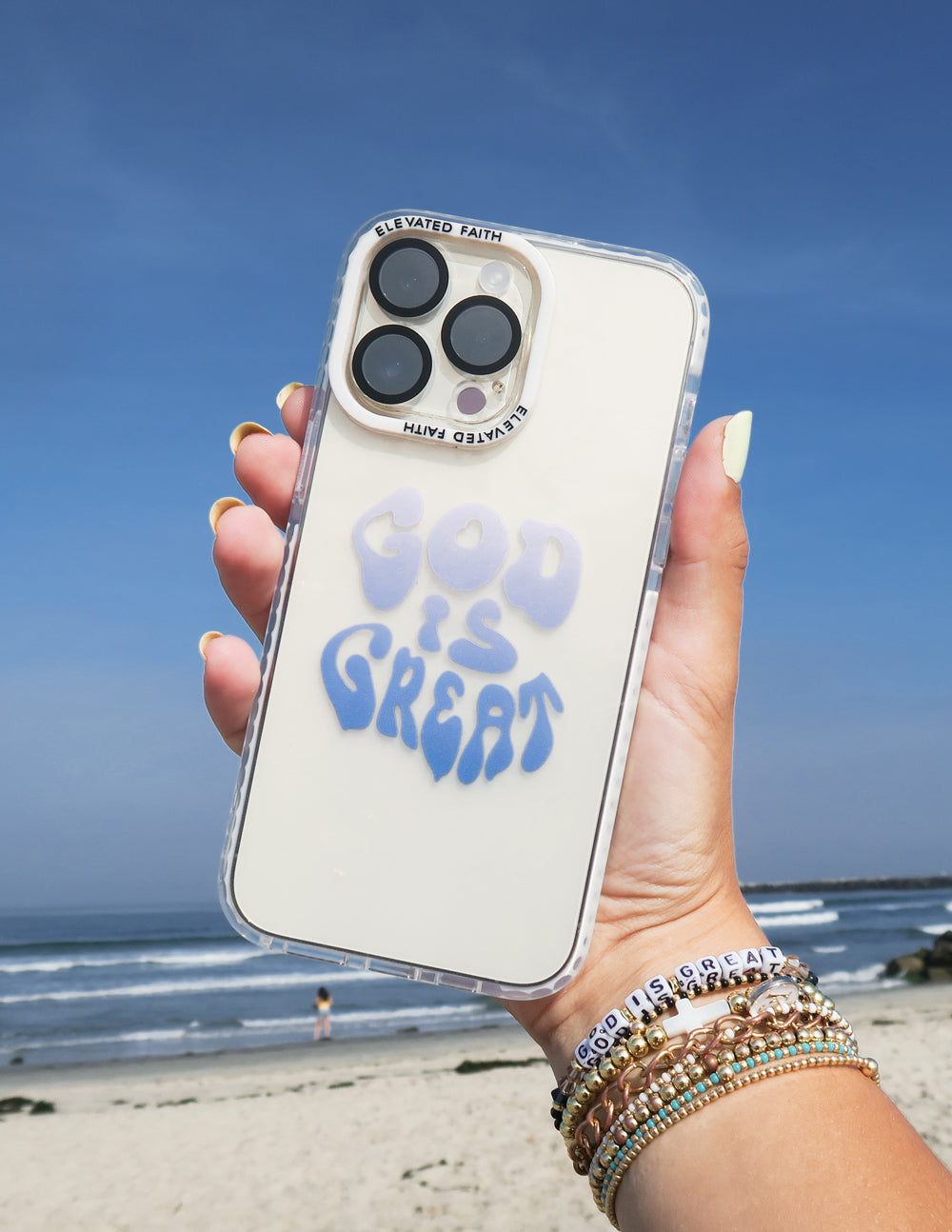 White phone case with 'God is Great' blue print and lens openings