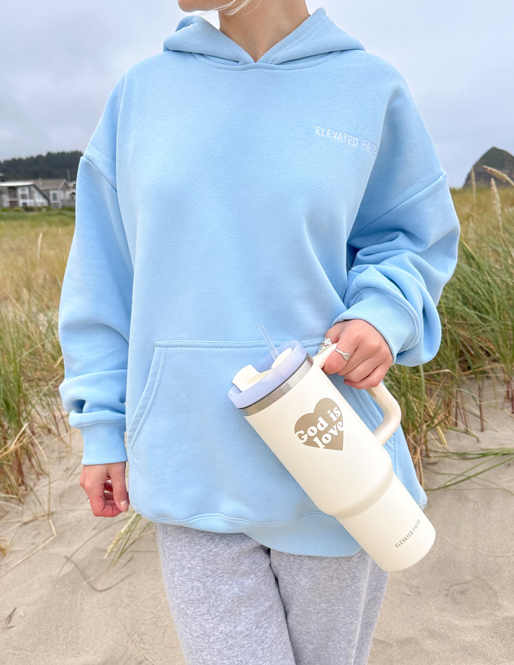 40 oz tumbler with straw and handle, cream body, "God is Love" heart print