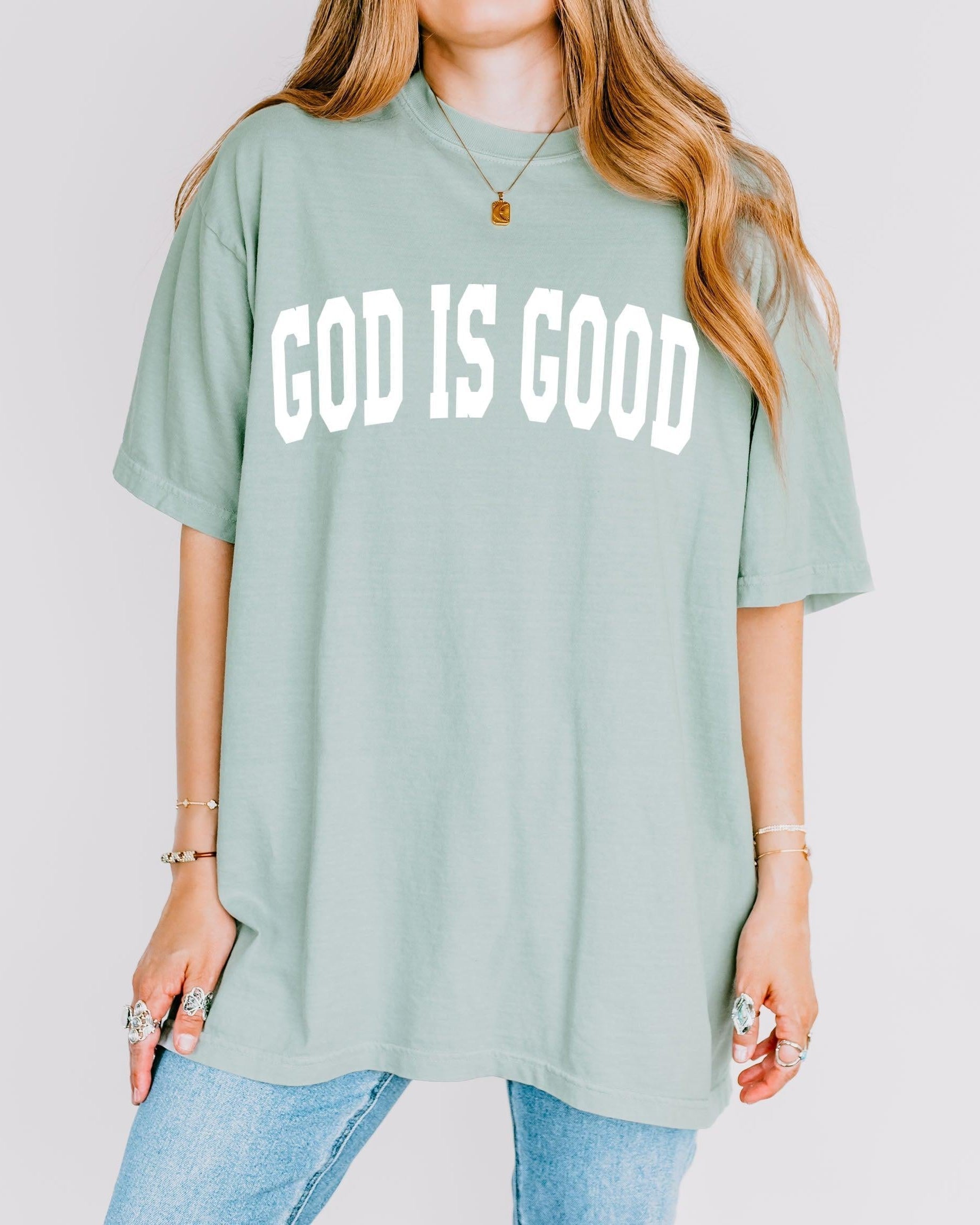 Light green garment-dyed crewneck T-shirt with “GOD IS GOOD” front print