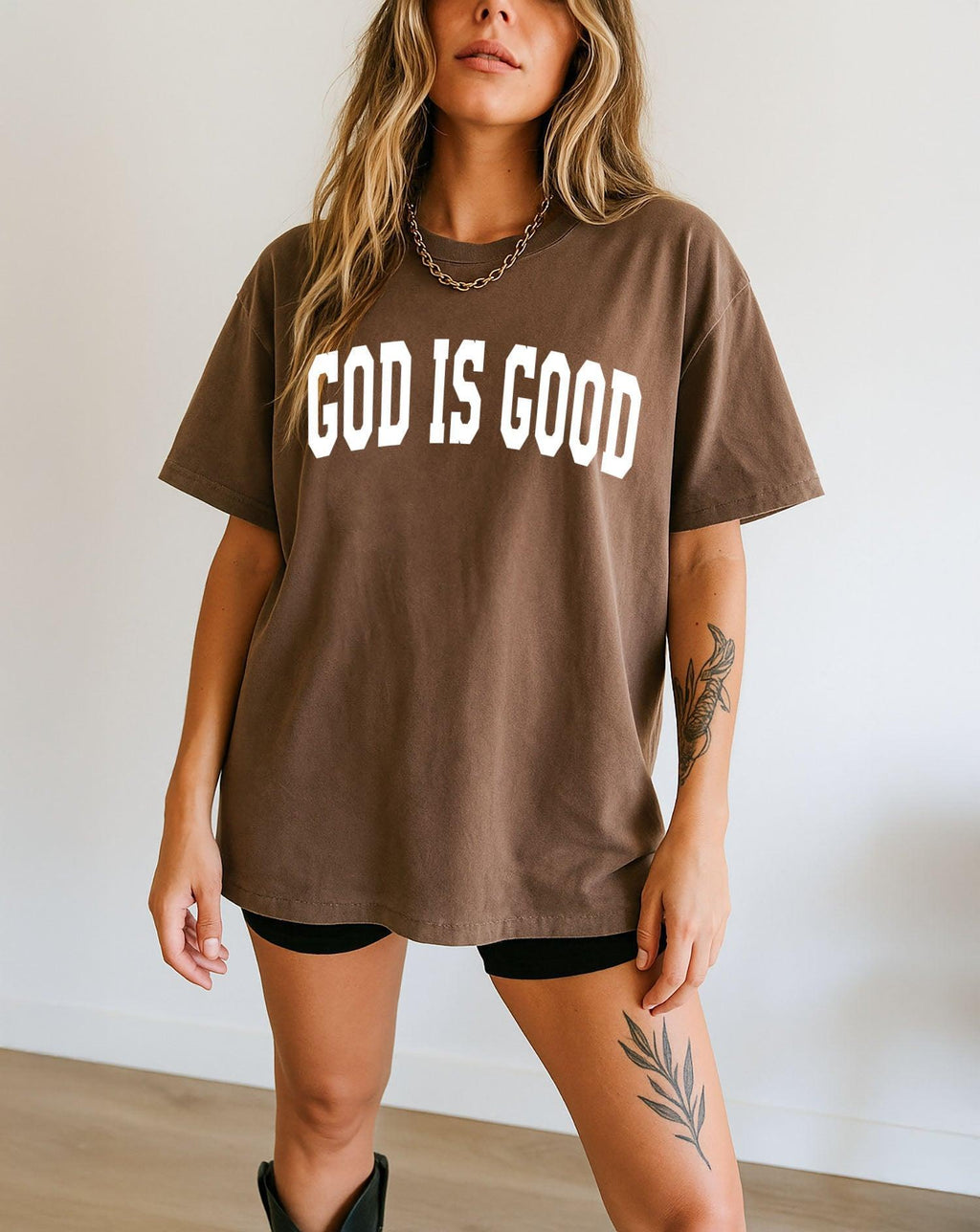 Espresso-brown garment-dyed crewneck T-shirt with “GOD IS GOOD” front print