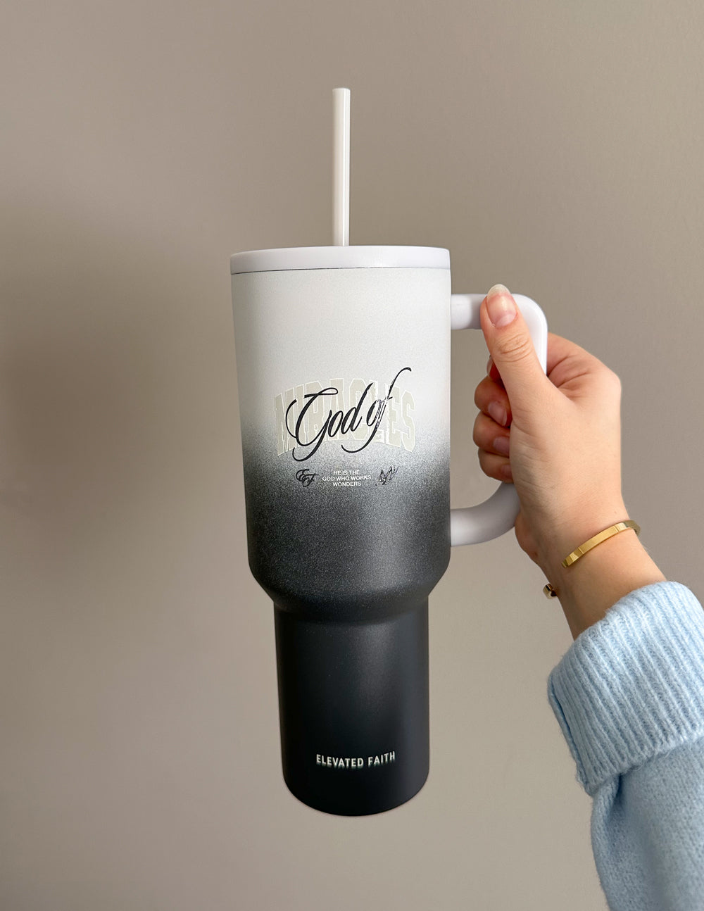 40 oz tumbler with straw and handle, white-to-black gradient; God of on front