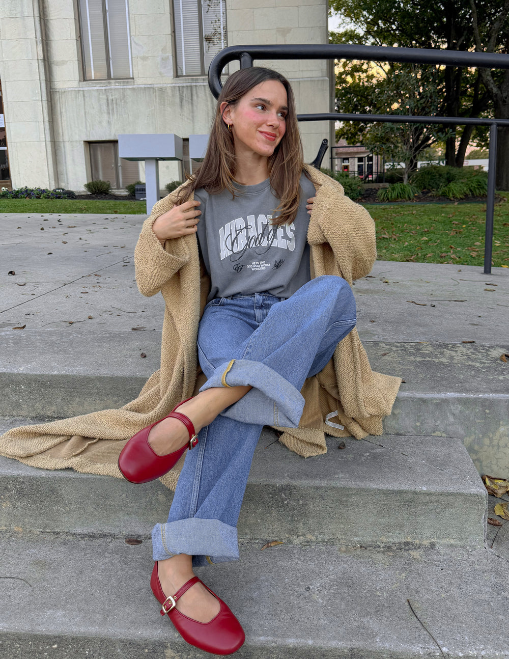 Cropped gray women’s tee with “Miracles” front logo graphic