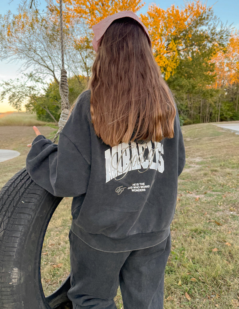Charcoal full-zip hoodie with back graphic and front kangaroo pocket