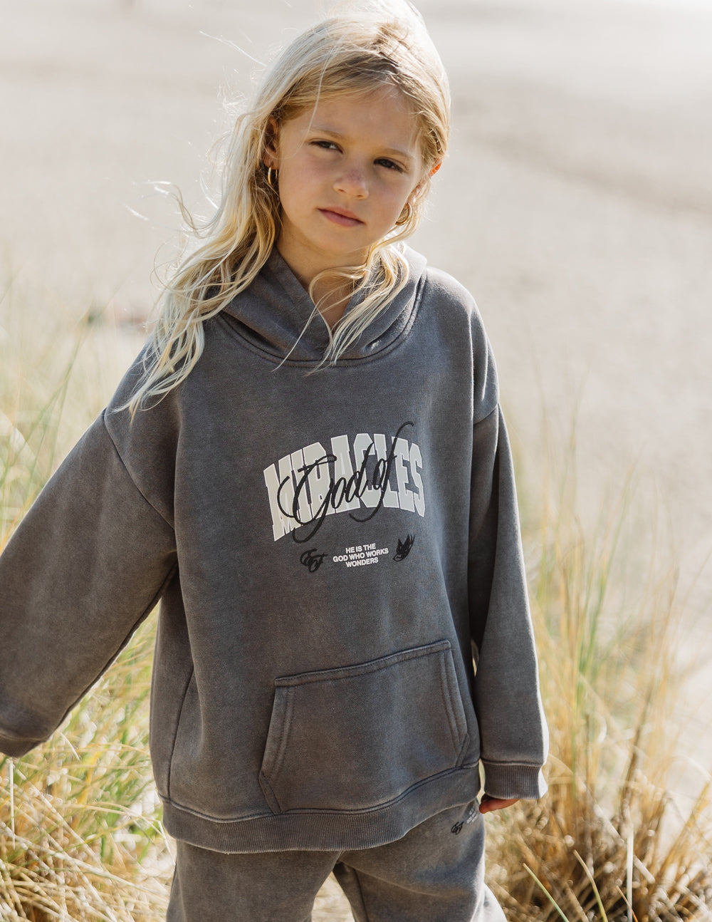 Kids dark gray hoodie, hooded pullover with printed chest graphic and kangaroo pocket