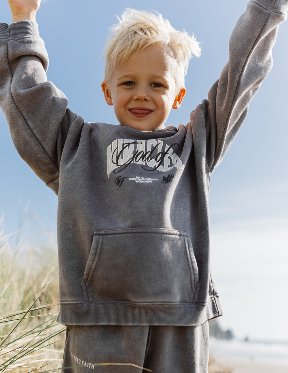 Kids dark gray hoodie with hood and front logo graphic, kangaroo pocket