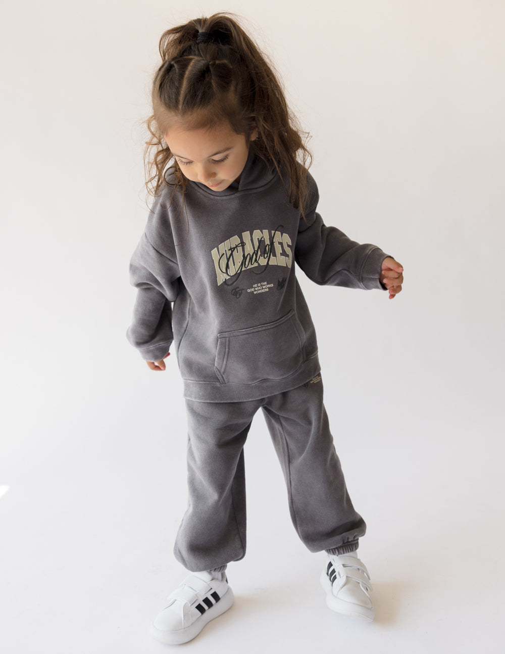 Kids dark gray hoodie with hood and front graphic, long sleeves and kangaroo pocket