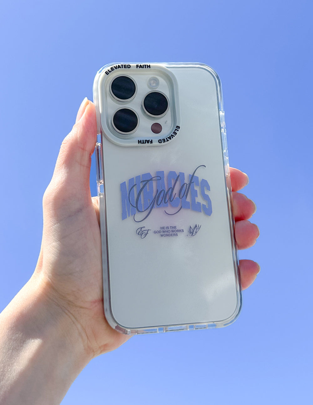 White phone case with blue “Miracles” script and clear protective border