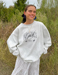 Heather gray unisex crewneck sweatshirt with front graphic logo and long sleeves.