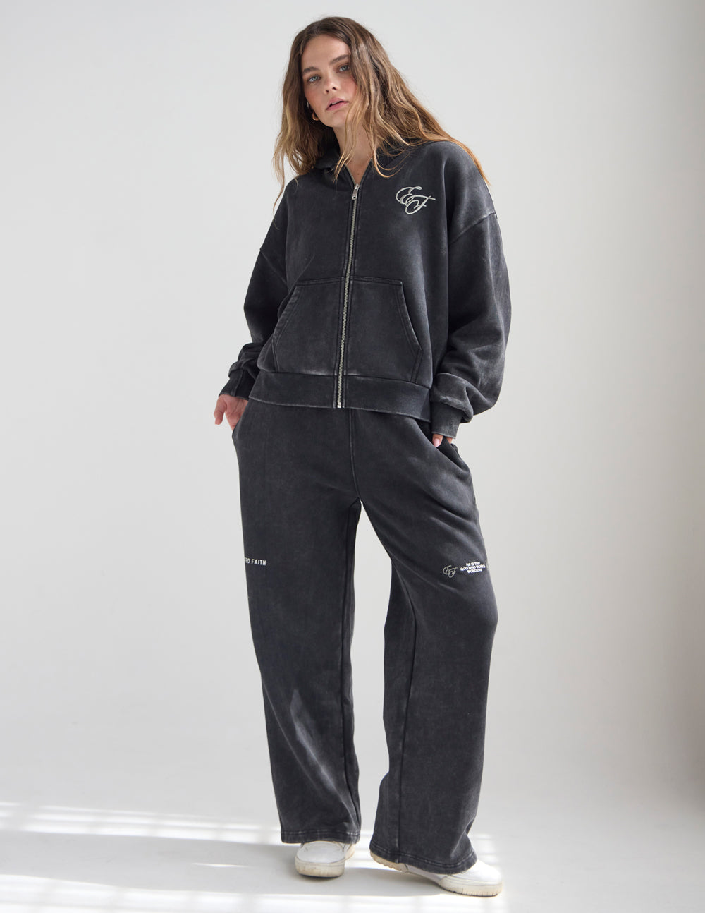 Charcoal wide-leg sweatpants with elastic waistband and small side logo