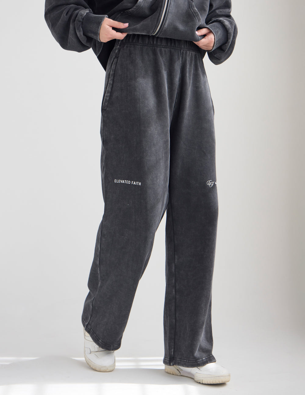 Charcoal wide-leg sweatpants with elastic waistband and small logo on side