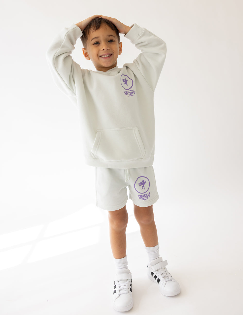 Kids light gray racing hoodie with purple logo, hood and front pocket