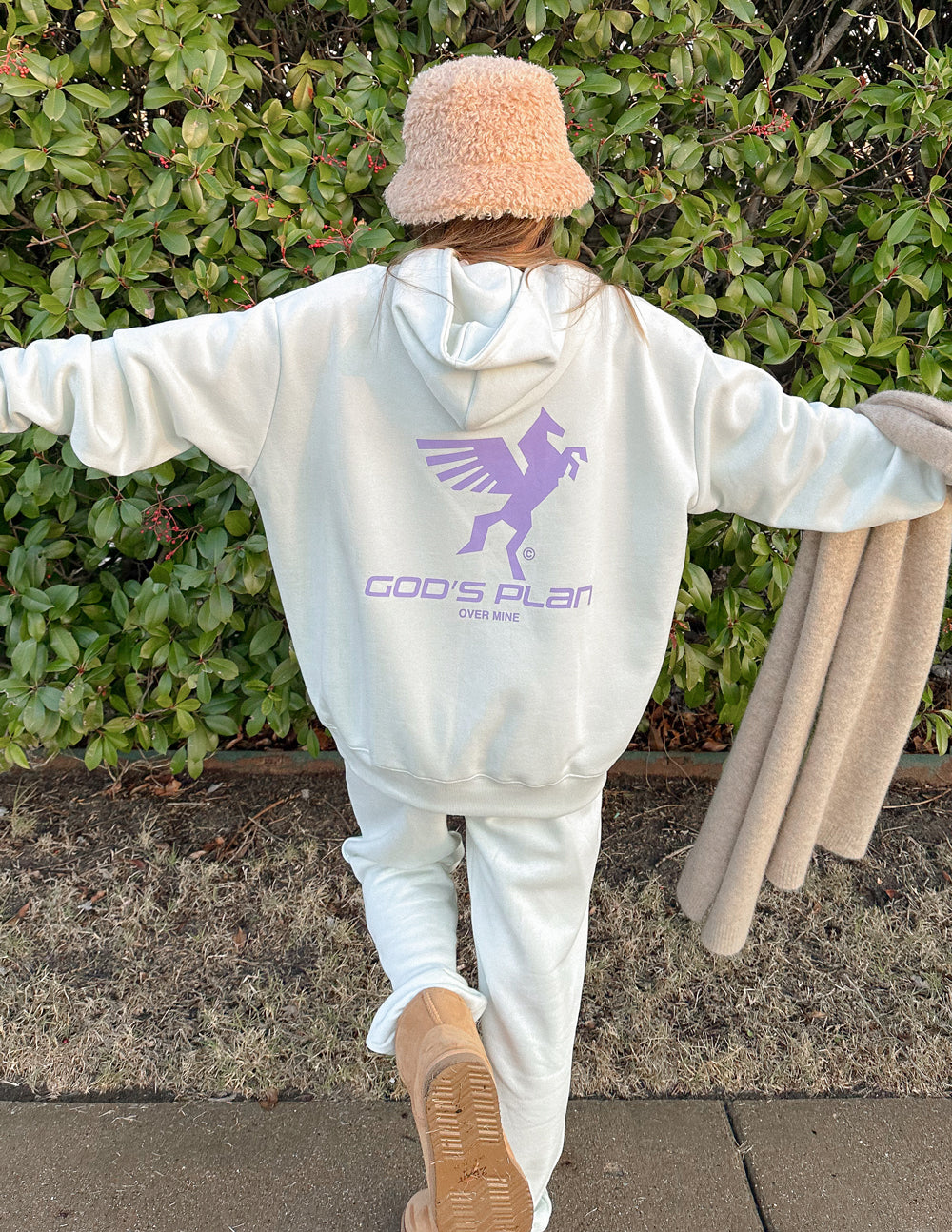 White unisex hoodie with purple racing logo graphic on back
