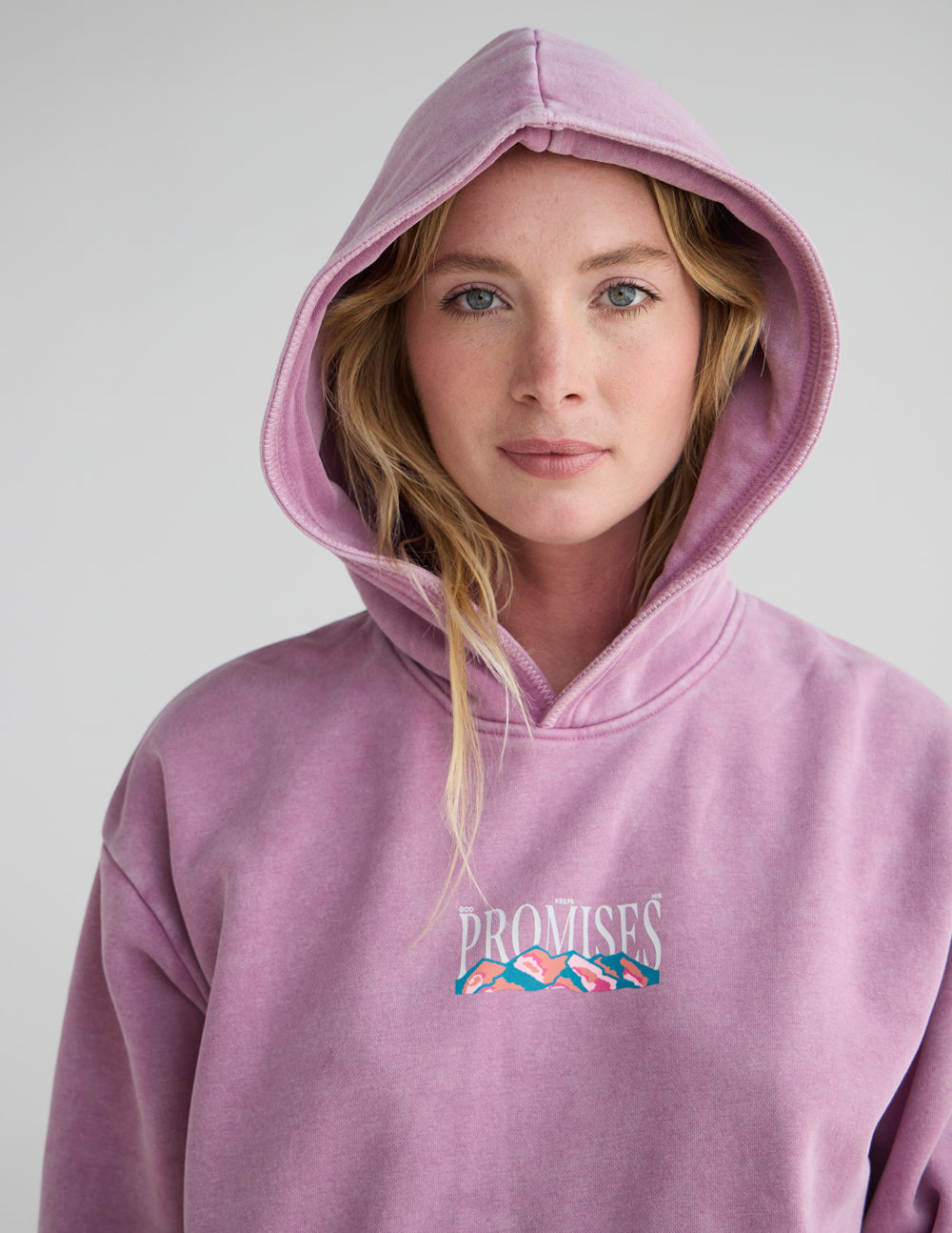 Lavender unisex hoodie with hood, front “Promises” chest graphic