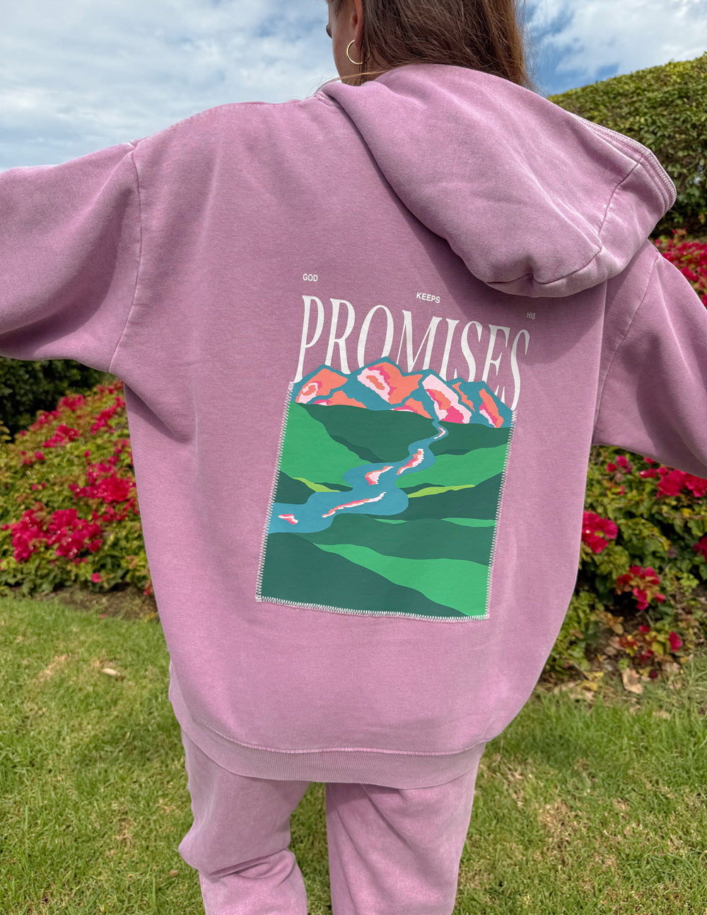 Lavender unisex hoodie back with large “Promises” landscape print and hood