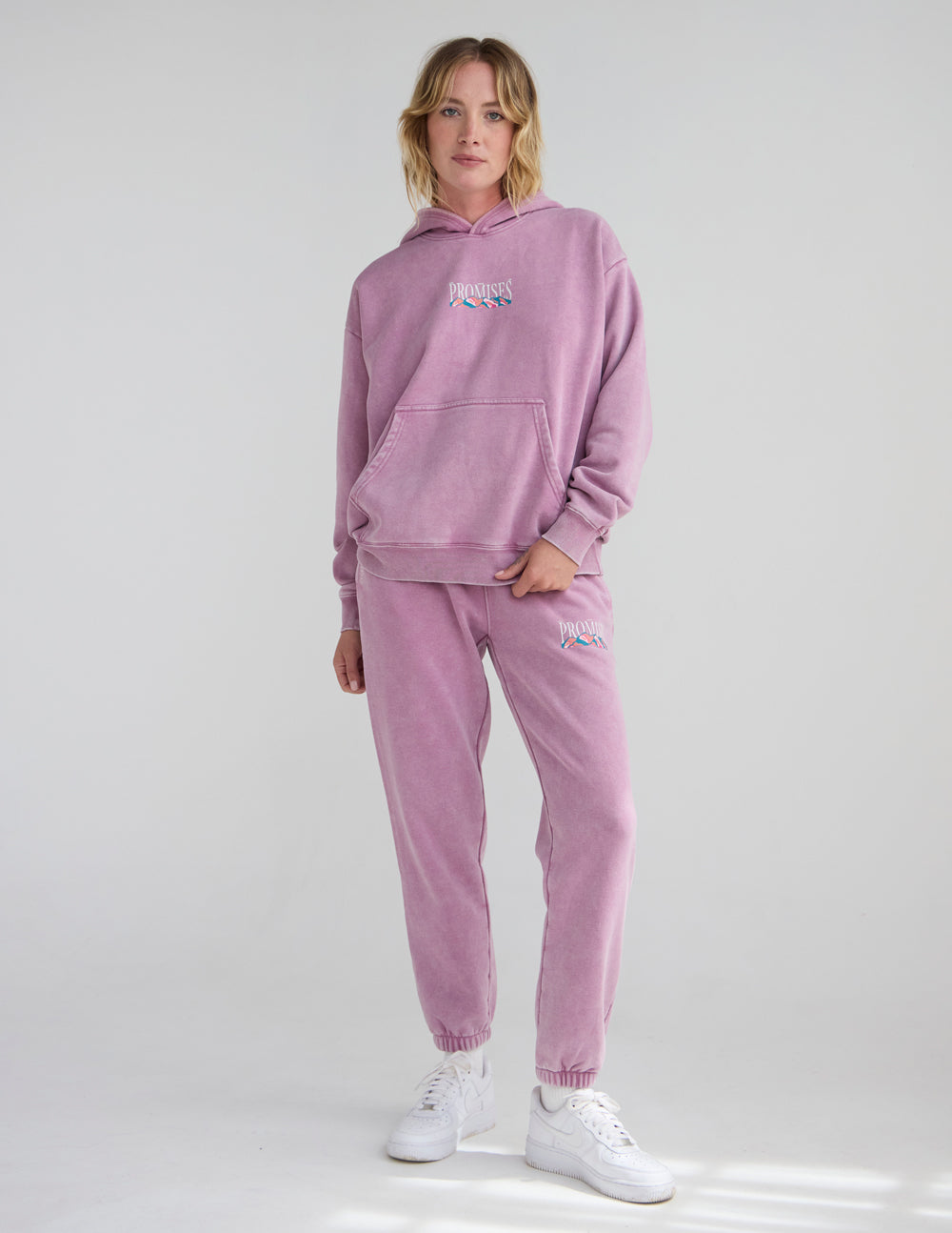 Lavender unisex sweatpants with embroidered thigh logo and jogger cuff hem