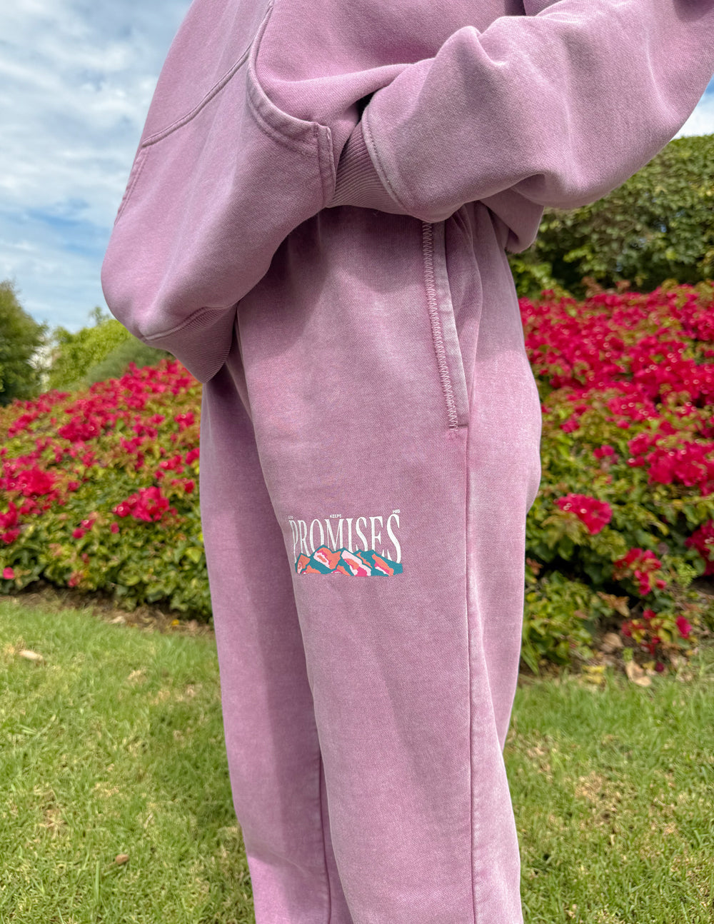 Lavender unisex sweatpants with elastic cuffs and front embroidered logo