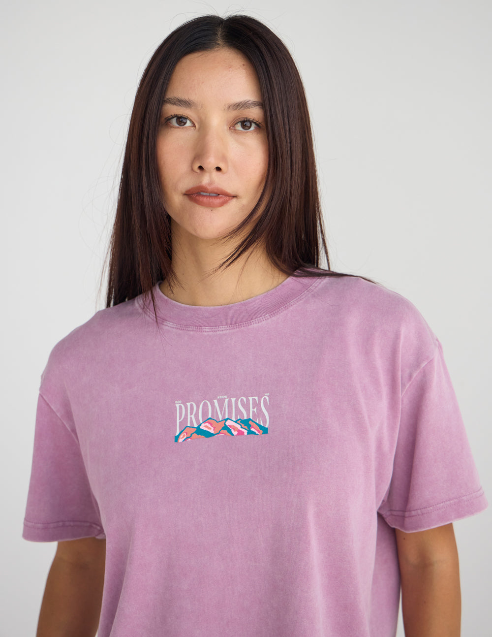 Lavender unisex T-shirt with front “Promises” logo and small landscape graphic.