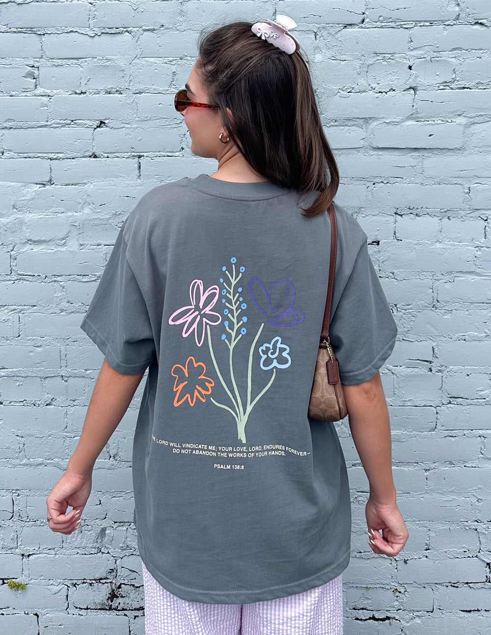 Unisex heather-gray tee with back floral graphic, short sleeves and relaxed fit