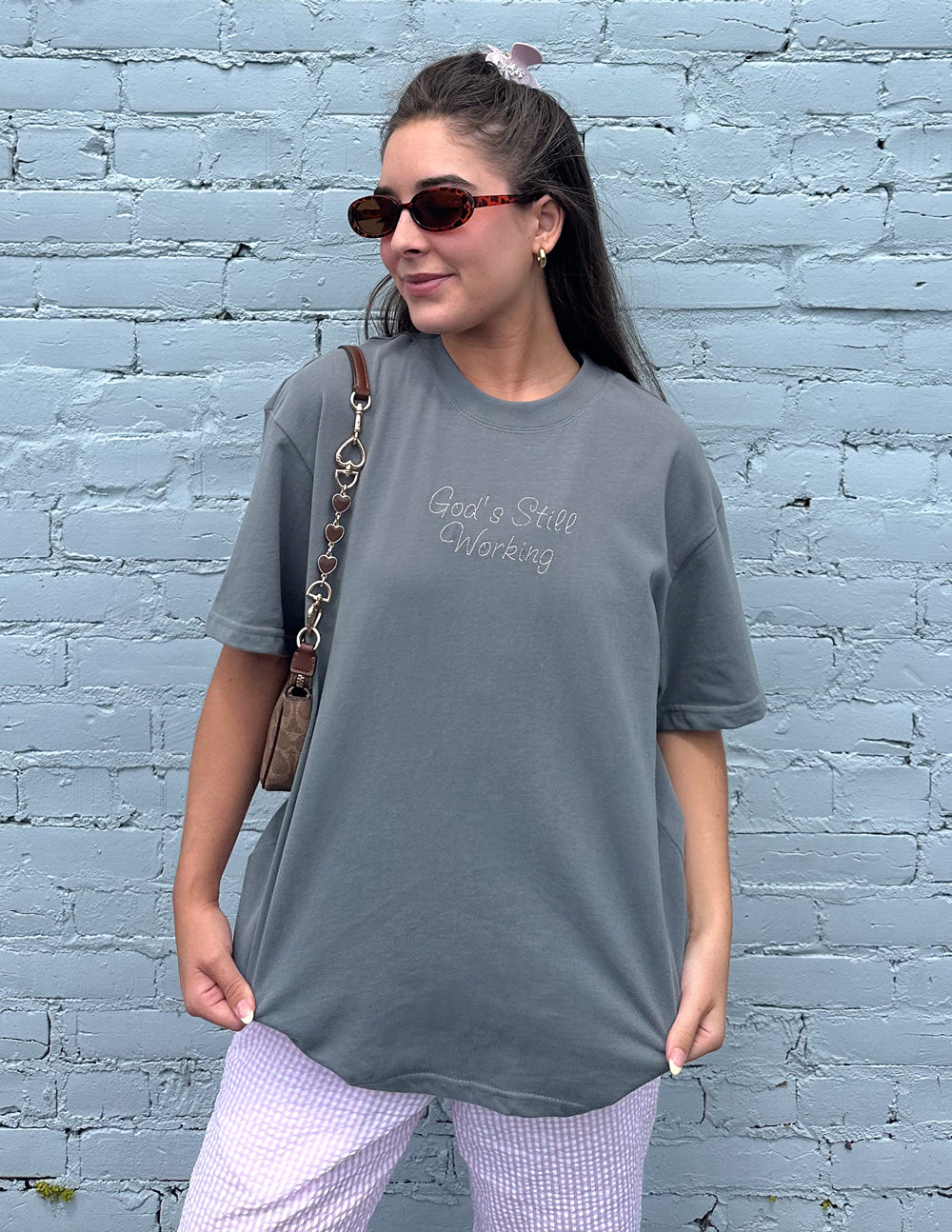 Unisex heather-gray graphic tee with front script logo, crew neck and short sleeves
