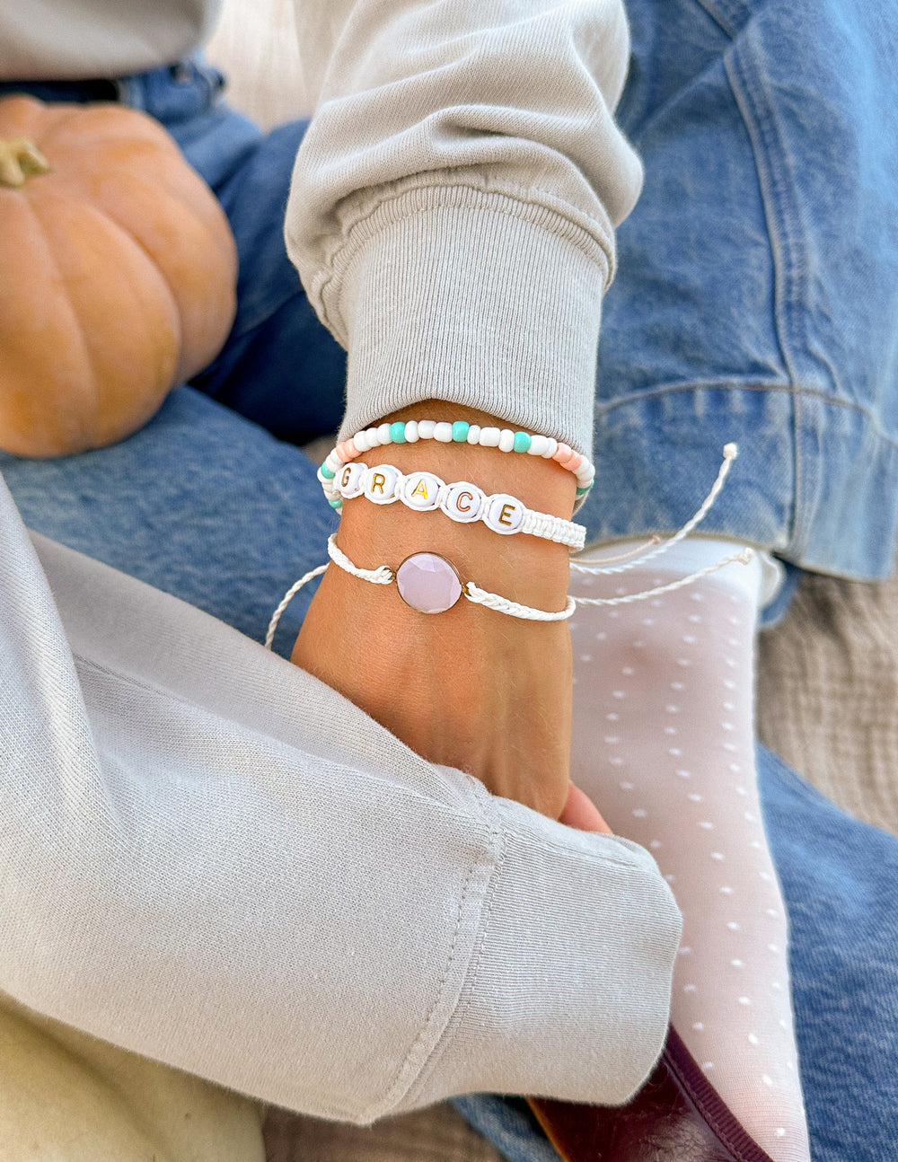 Grace bracelet pack: three bracelets on ankle with multicolor beads and round charms