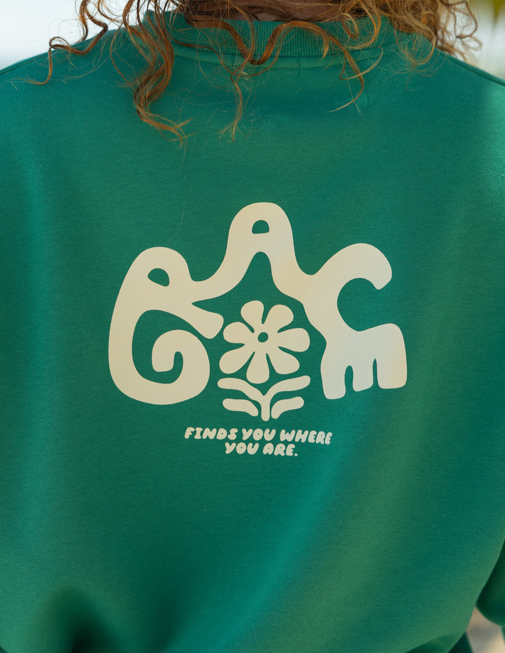 Green crewneck sweatshirt close-up of back elephant floral logo