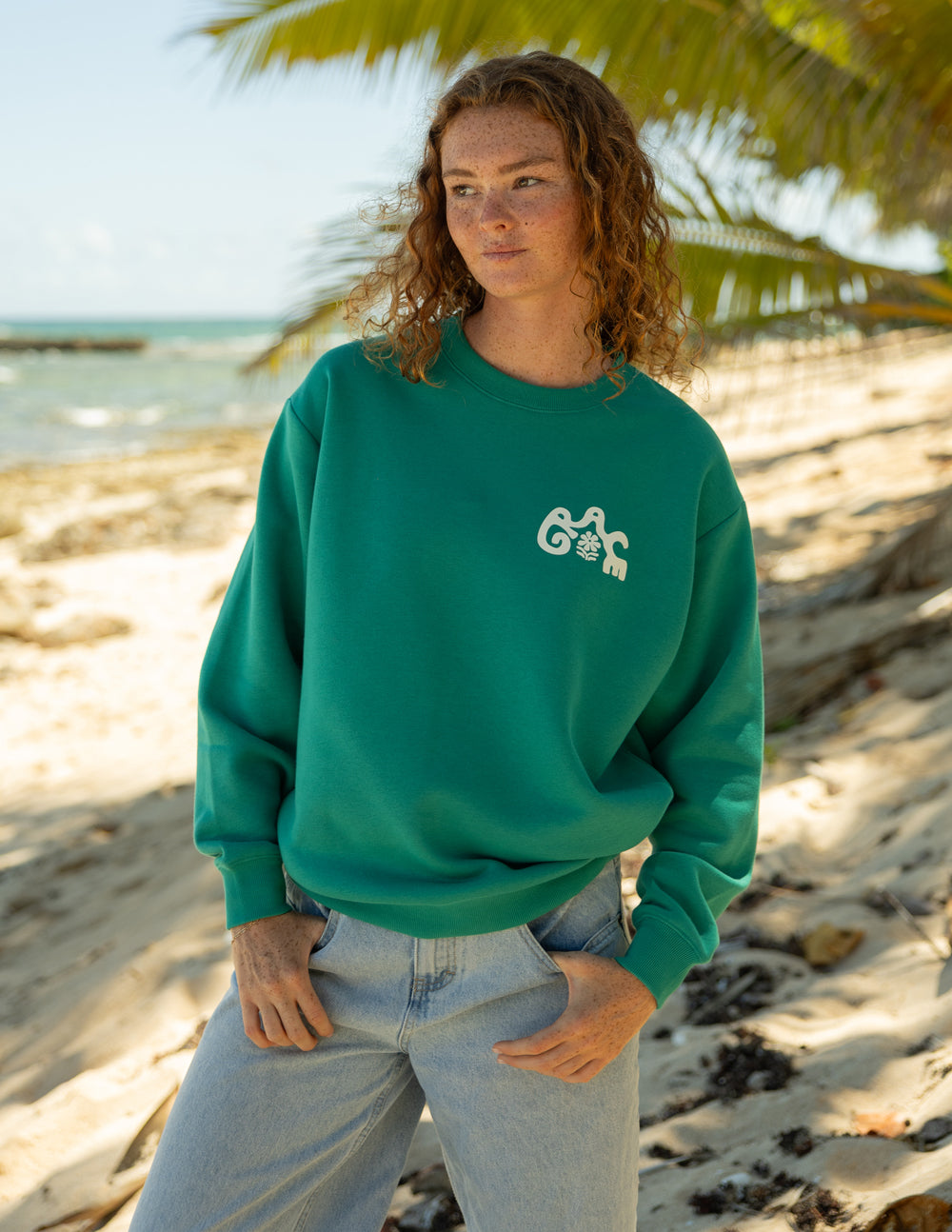 Green unisex crewneck sweatshirt, chest logo and relaxed fit
