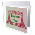 Stacked greeting cards: red Eiffel Towers with 'Joyeux Noel' on green and pink