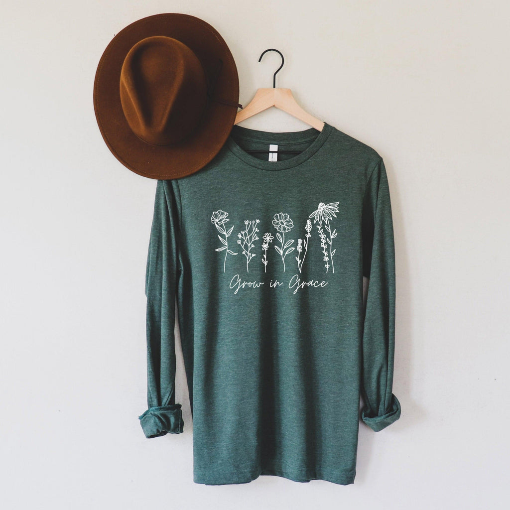 Forest green long sleeve T-shirt with white botanical “Grow in Grace” graphic