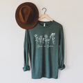 Forest green long sleeve T-shirt with white botanical “Grow in Grace” graphic