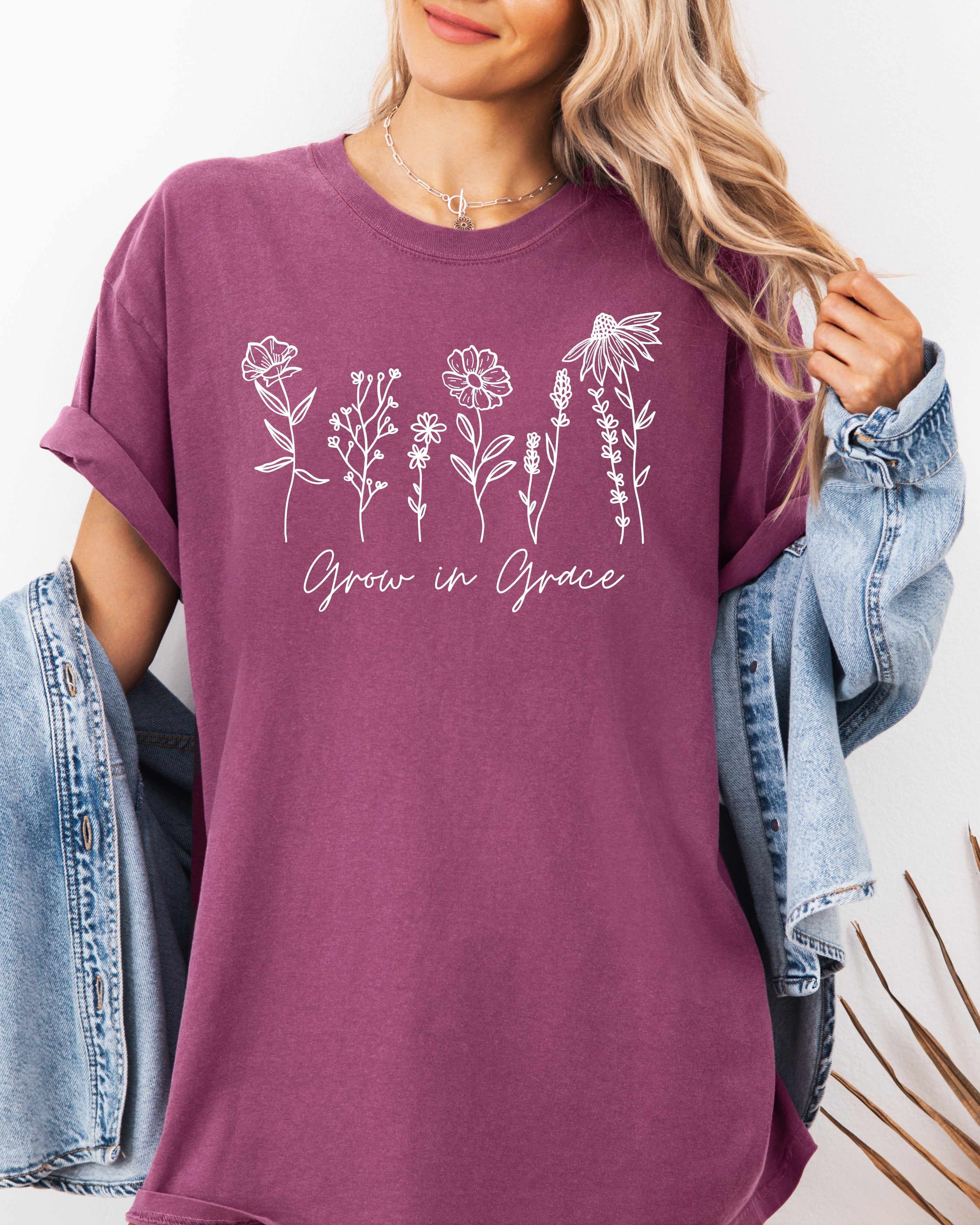 Purple T-shirt with floral 'Grow in Grace' graphic