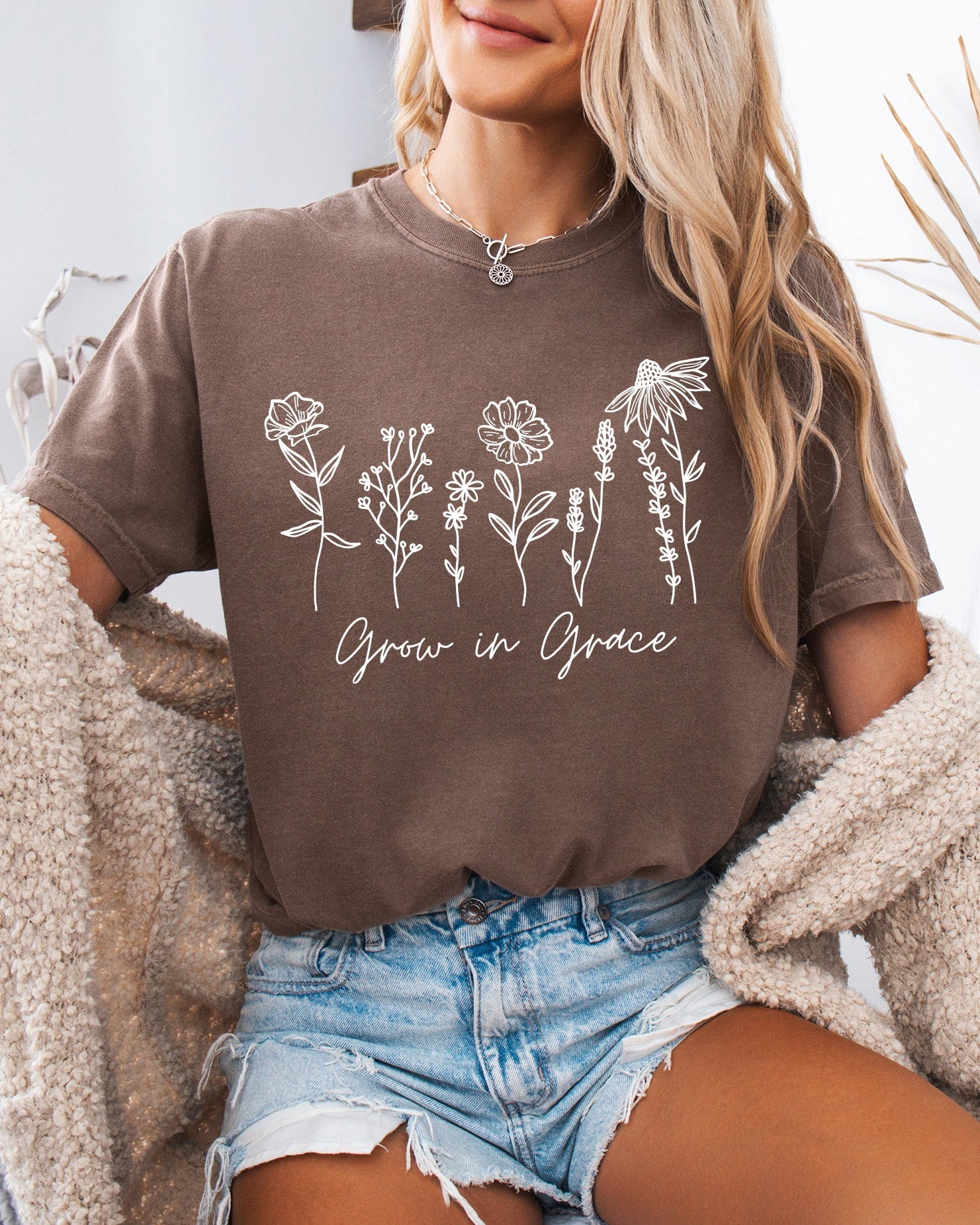 Brown T-shirt with floral 'Grow in Grace' graphic