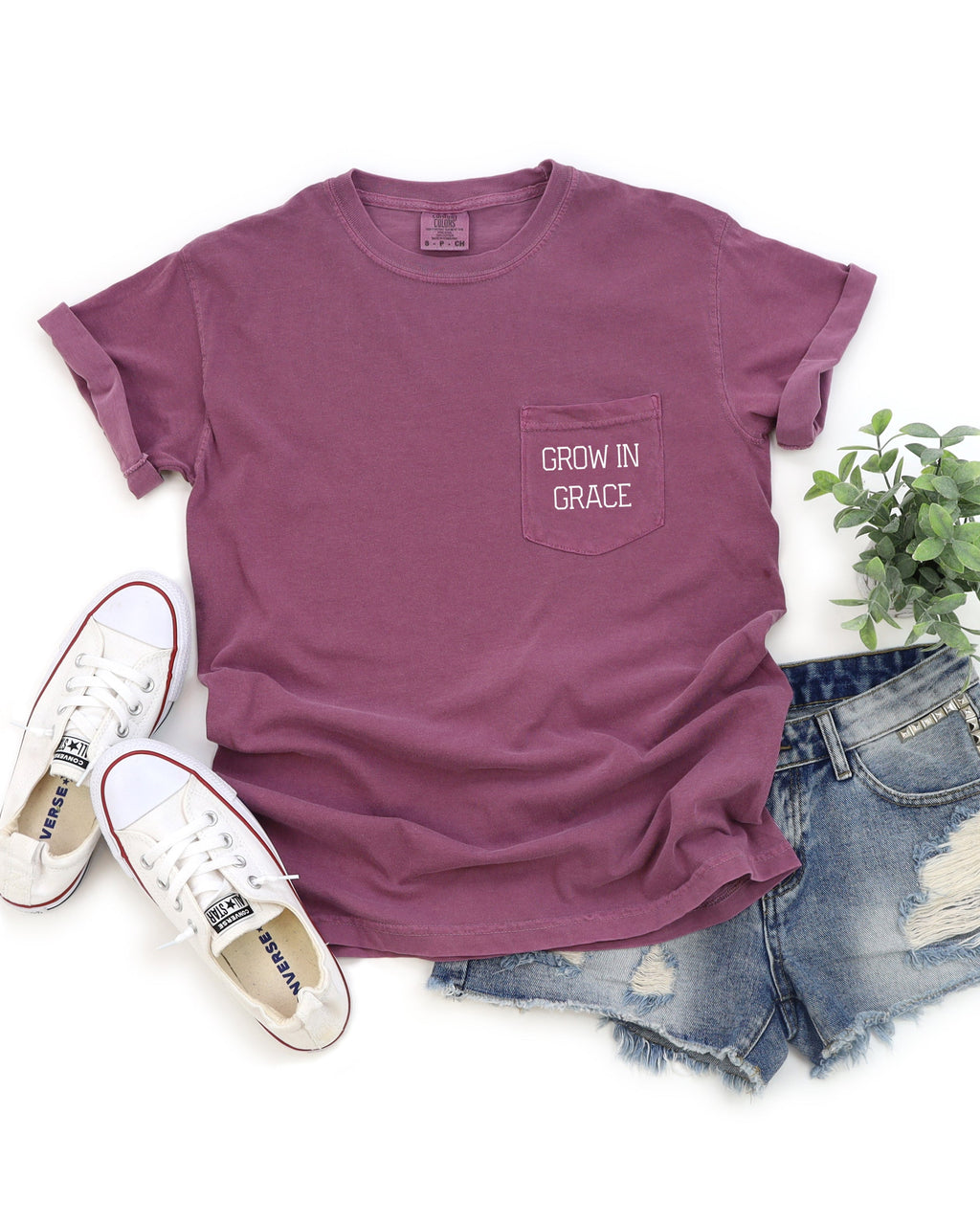 Mauve pocket t-shirt with "Grow in Grace" chest graphic.