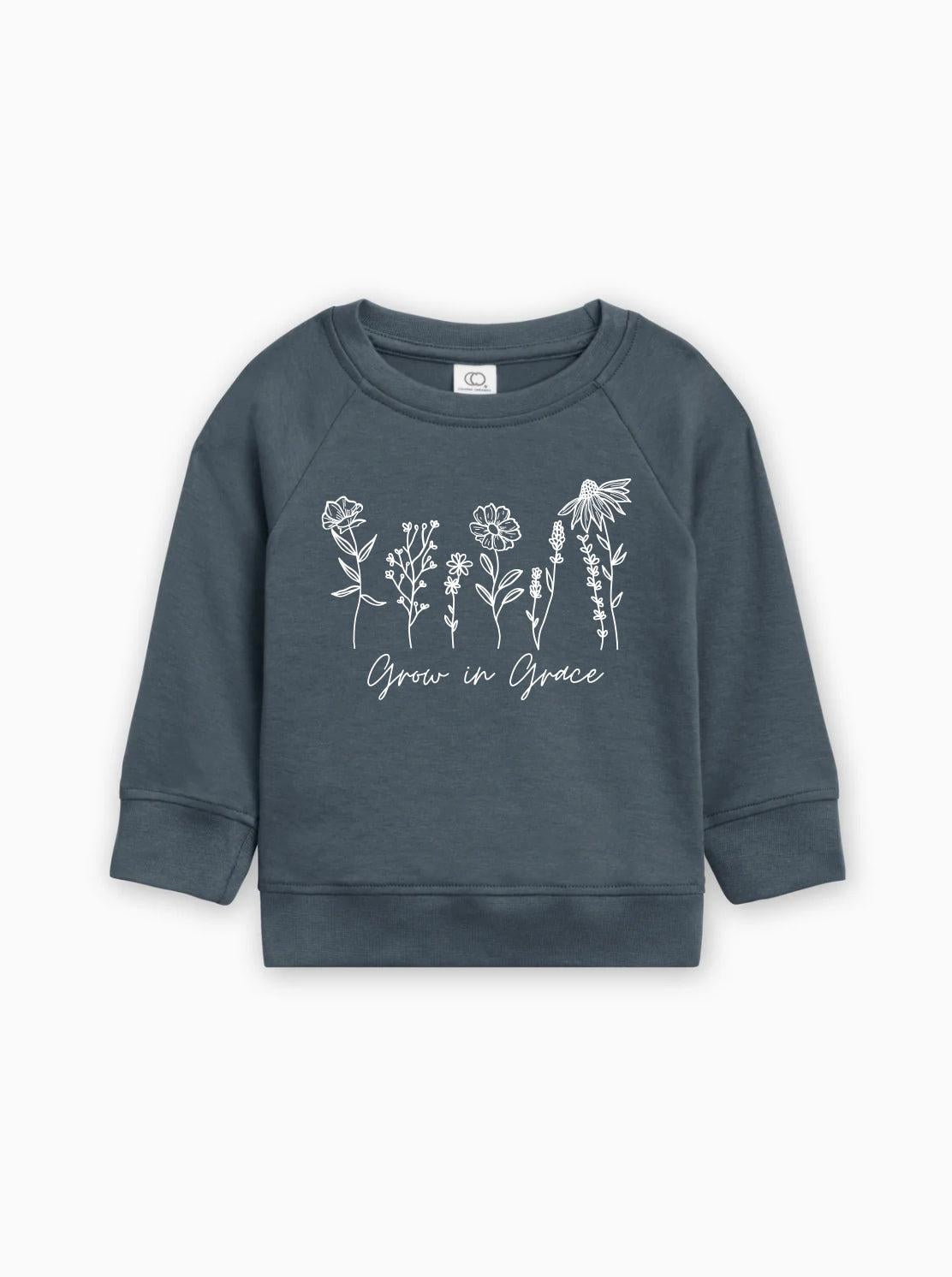 Navy toddler pullover with long sleeves and white botanical 'Grow in Grace' graphic