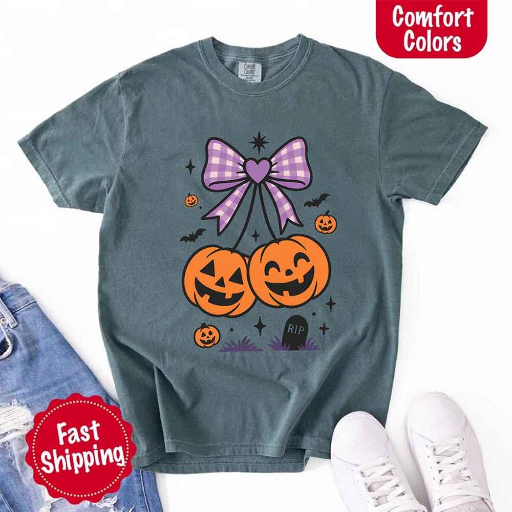Blue spruce Halloween graphic T-shirt with bow and jack-o'-lantern pumpkins front