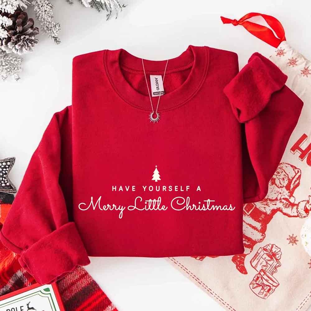 Red crew-neck sweatshirt with Merry Little Christmas text and tree graphic