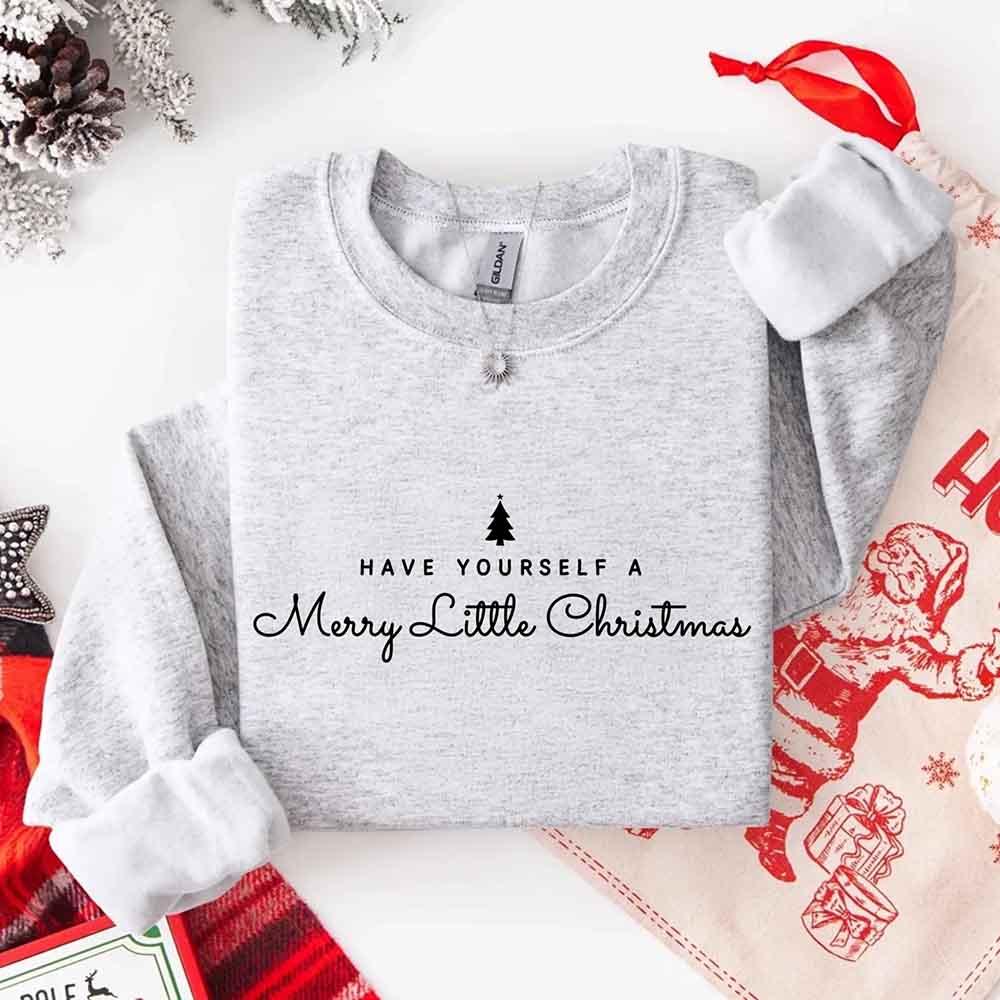 Grey crew-neck sweatshirt with Merry Little Christmas text and tree graphic
