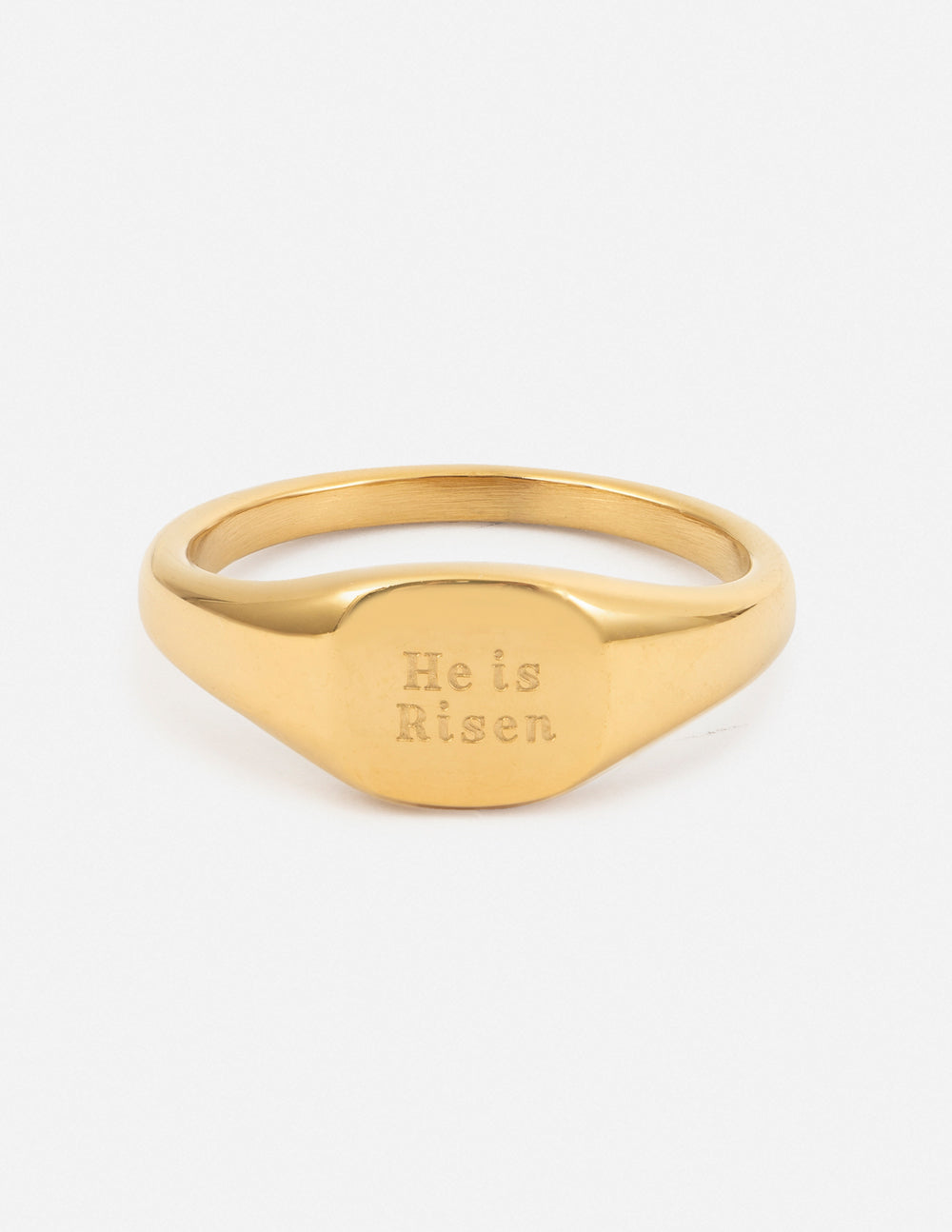 Gold signet ring with engraved 'He is Risen' on the face