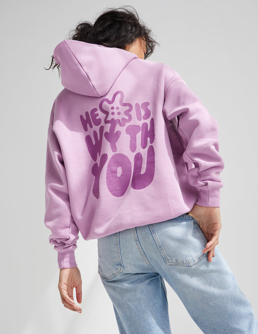 Back view of lilac unisex hoodie with large graphic and pullover hood